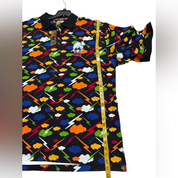 YO ME .Dynamic Black and Orange Polo Shirt with Geometric Pattern - Picture 6 of 7